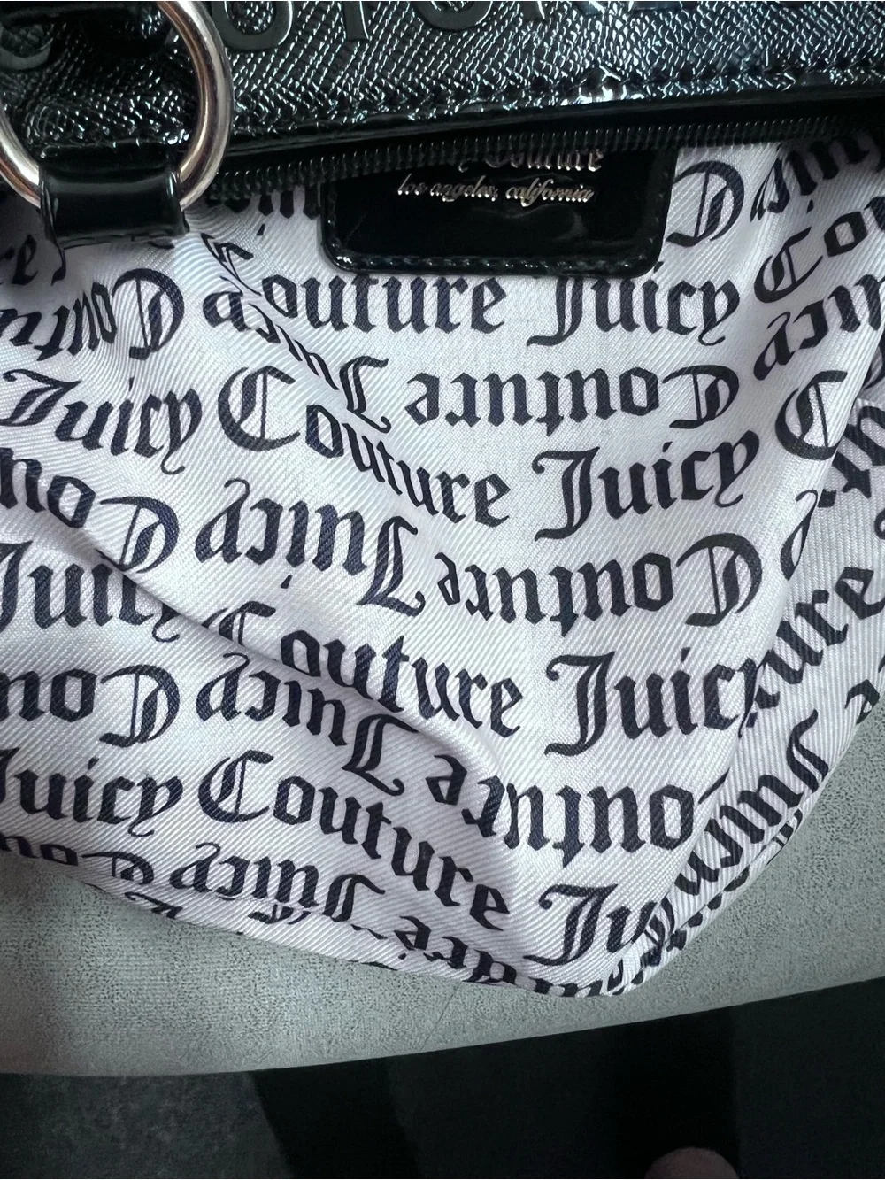 Juicy Couture Black “ my heart will go on Satchel “ color licorice 2022
